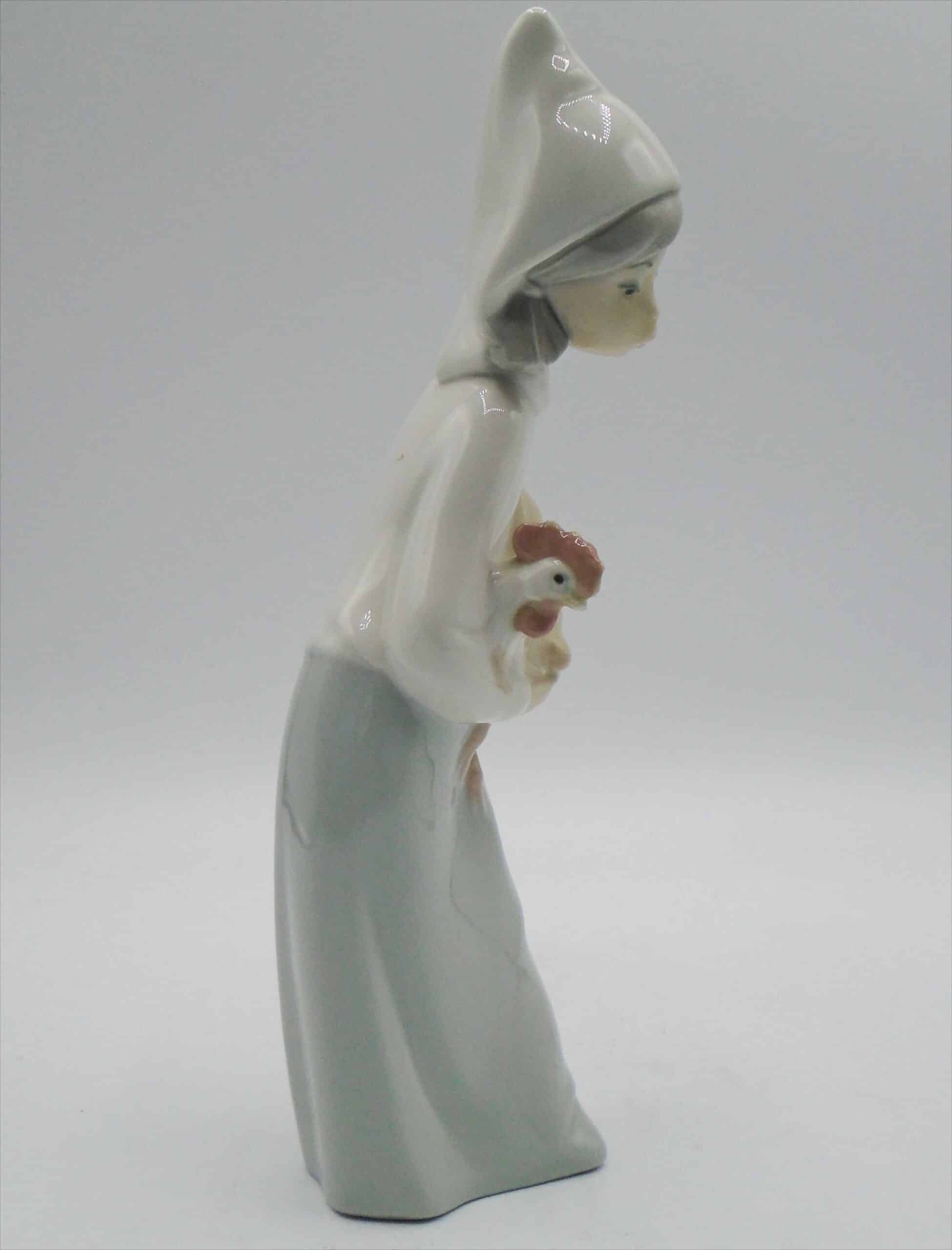 Lladro Porcelain Figurine Of Woman Holding A Chicken - Image 2