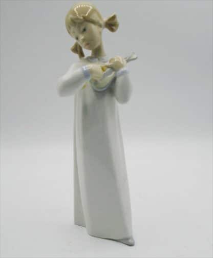 Lladro Porcelain Figurine Of A Girl Playing Guitar