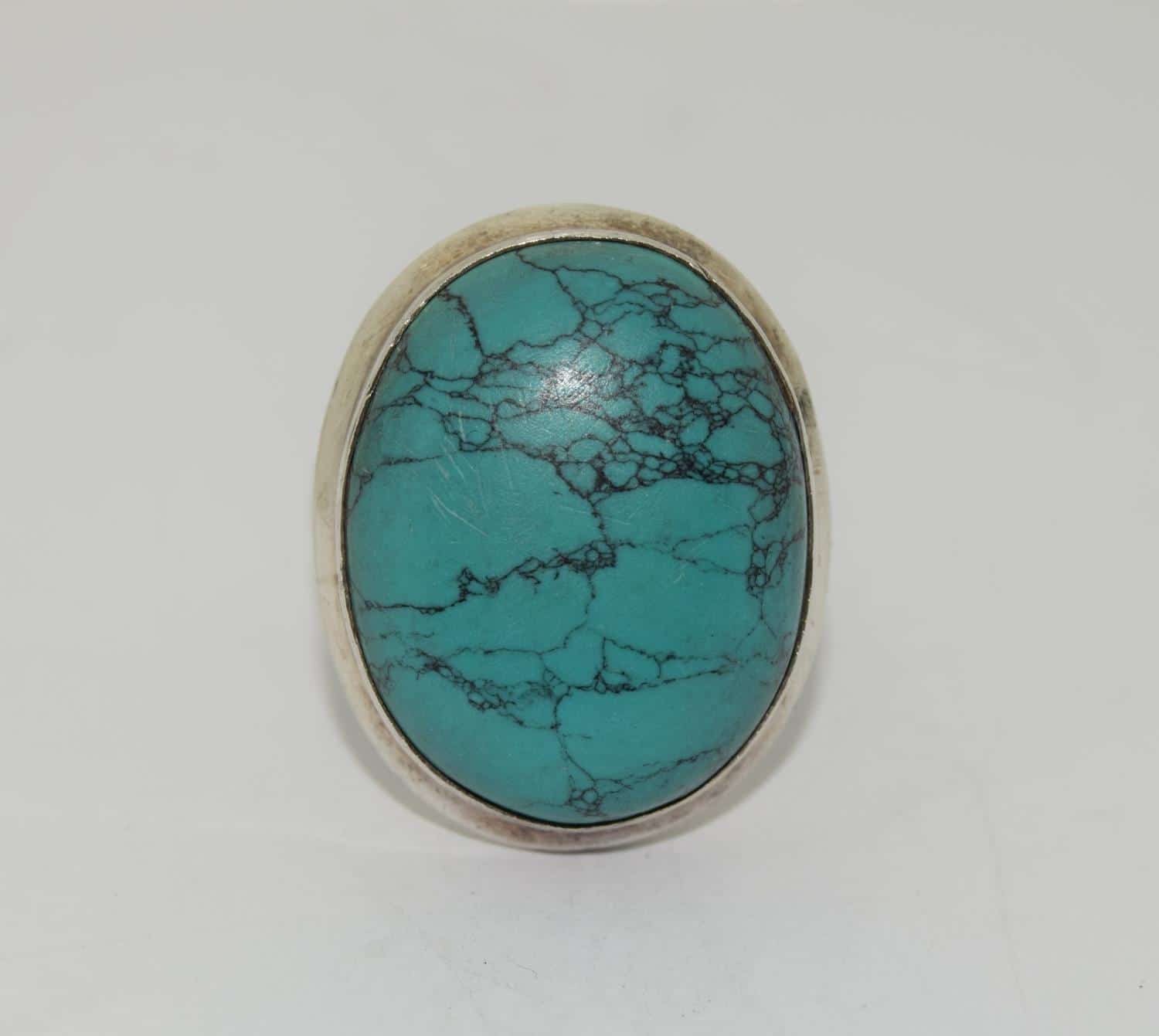 A Vintage And Very Large Turquoise Stone Silver Ring