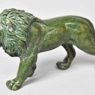 Carved Green Stone Figure of a Prowling Lion